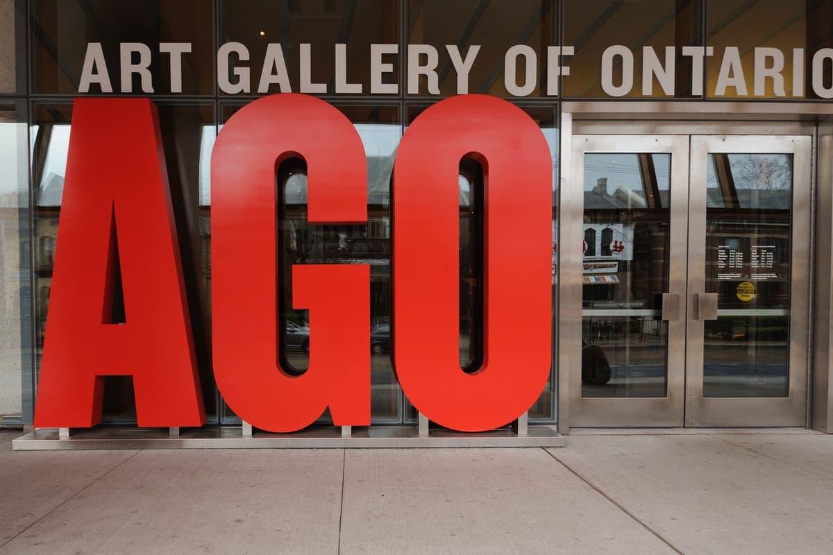 Red AGO letters outside the Art Gallery of Ontario on Dundas Street West