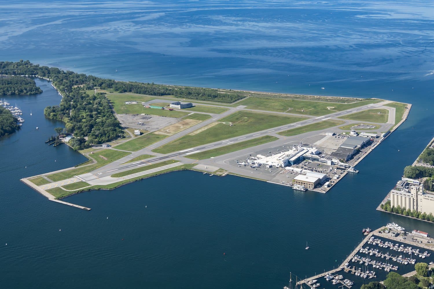 Billy Bishop Toronto City Airport seen from the CN Tower, with its runway, terminal and surrounding water