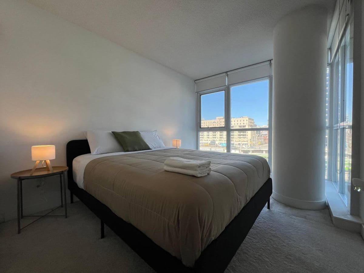 A real bedroom in one Parade one-bedroom-plus-den suite in CityPlace