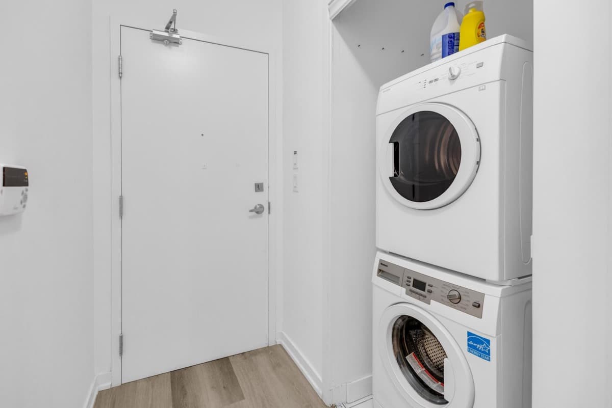 Washer and dryer inside a real StayToronto York furnished suite