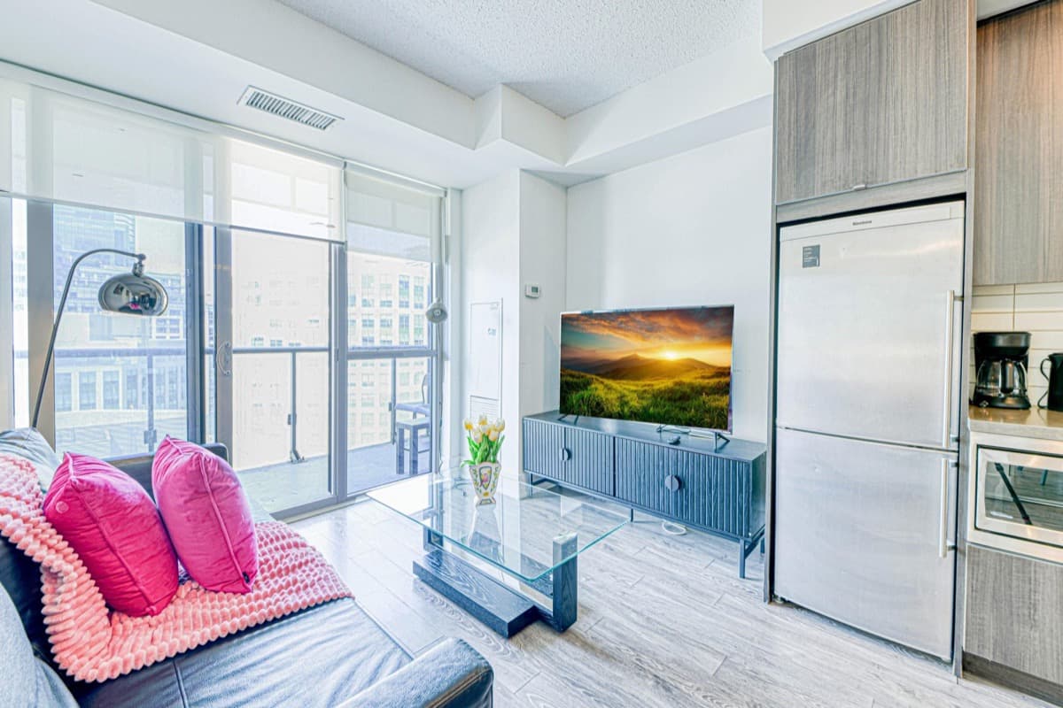 Living area and kitchen in a real StayToronto furnished suite in downtown Toronto